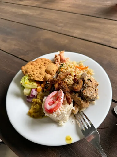 Fried rice plate with chicken and fresh salad at Hambu Café