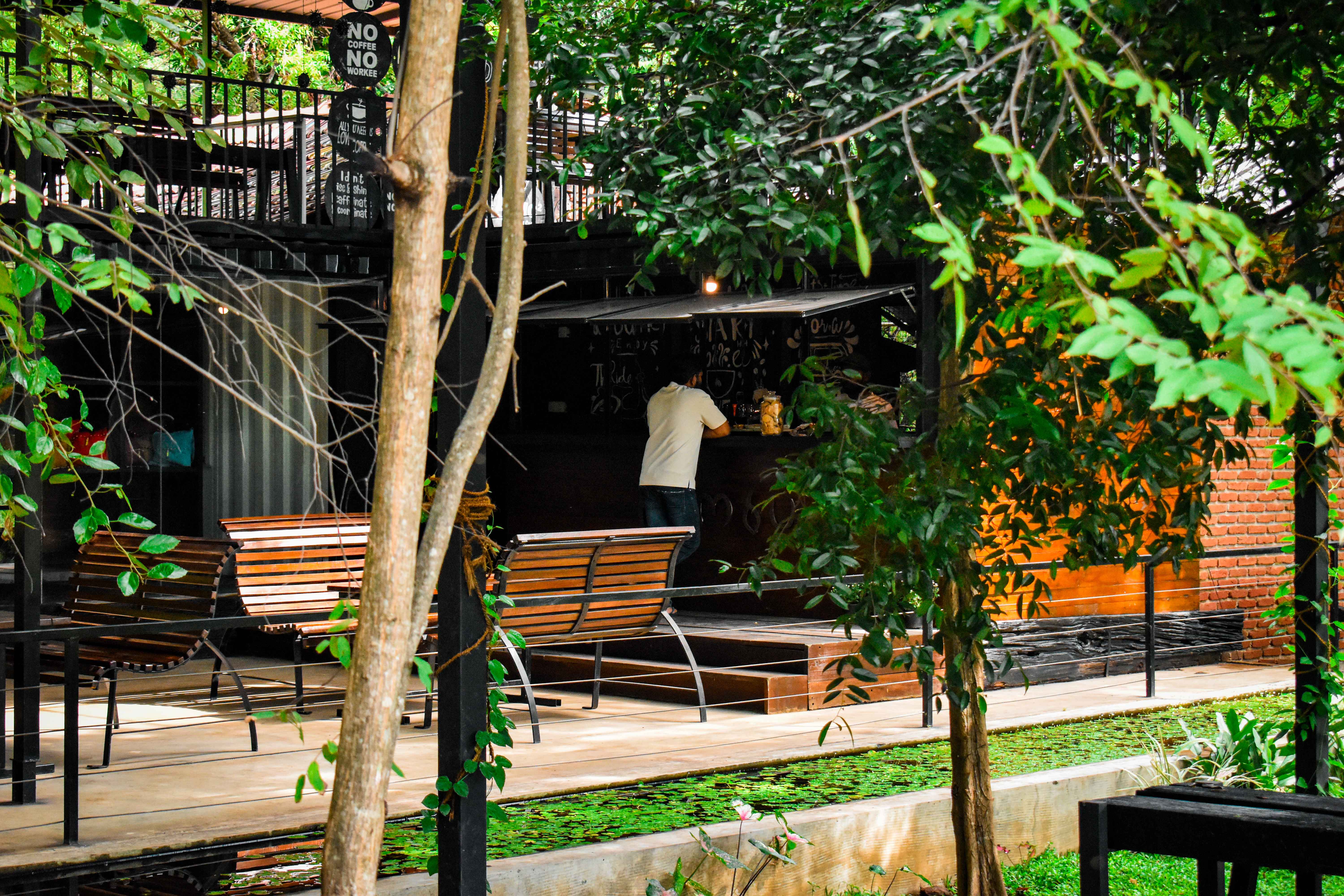 Outdoor seating area surrounded by nature