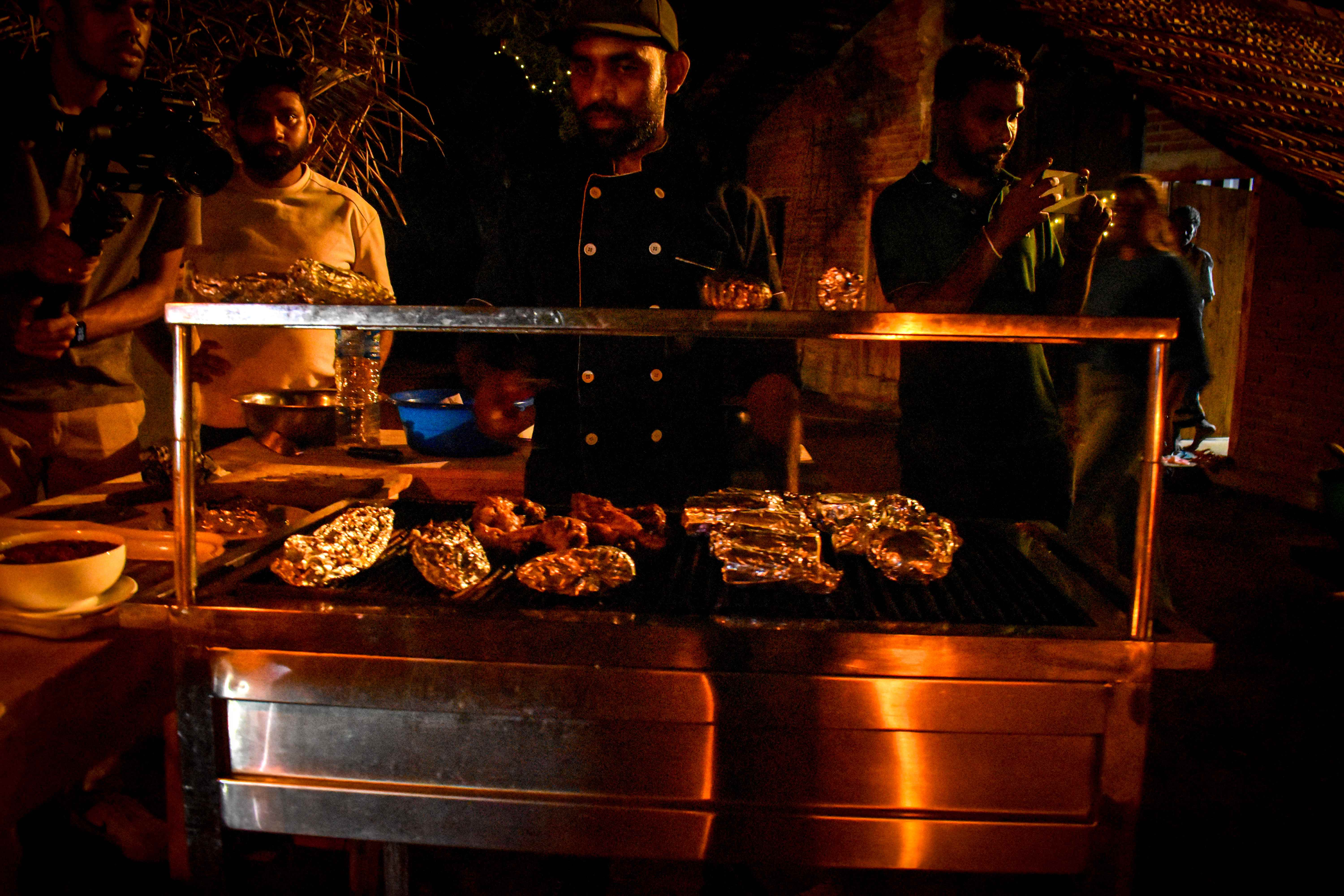 Chefs preparing special dishes at a cooking station